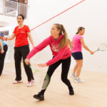The Brooklyn community's kids squash scene is growing and making a difference.